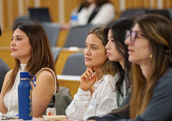 Students in the Flex MBA program listen in classroom during their Leadership Communications weekend