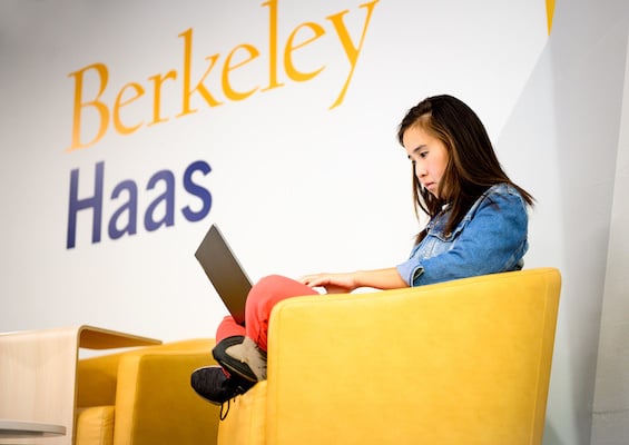 Berkeley Haas student sitting in Berkeley Haas Library